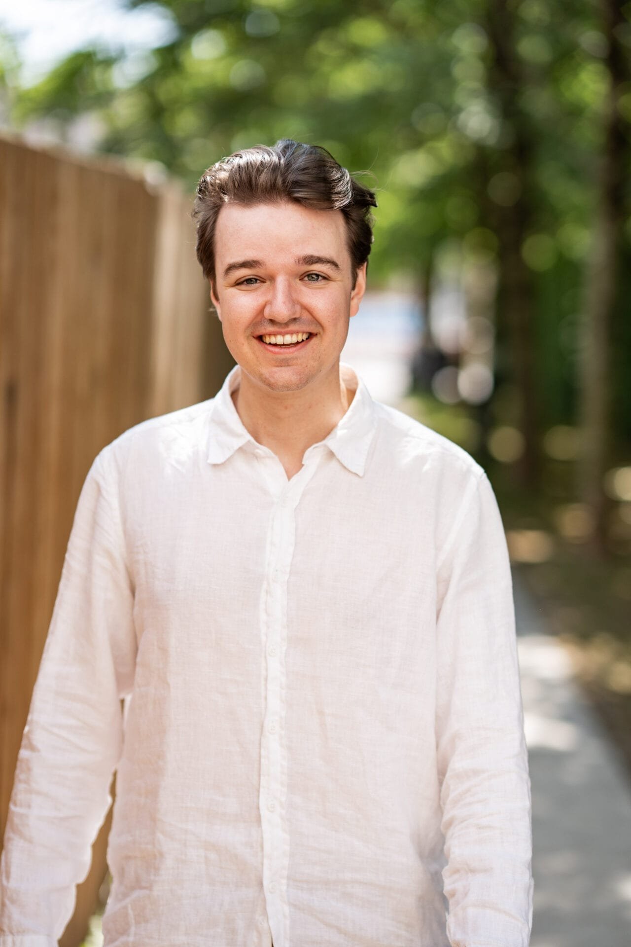 portrait of Johannes Eder in a white shirt
